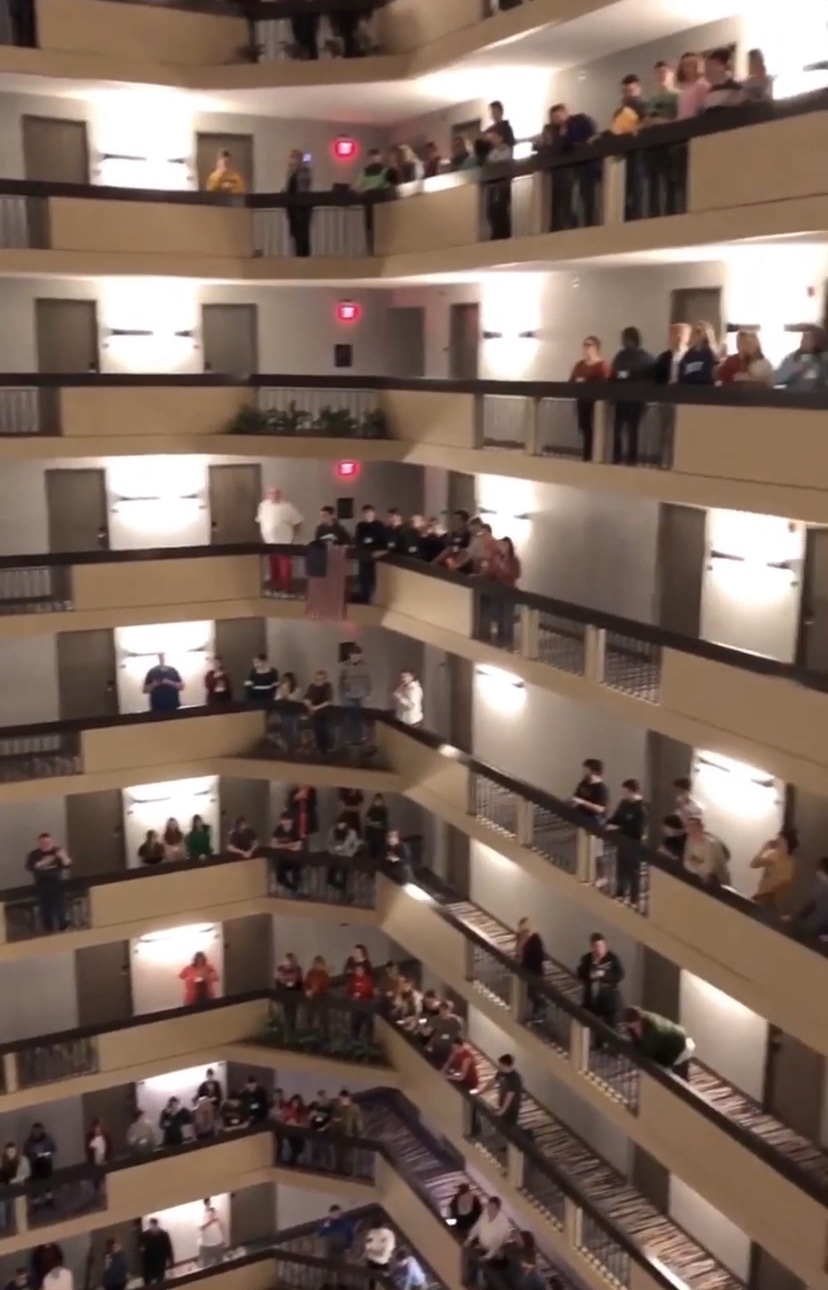 MUST SEE! Hundreds of Students Gather In Hotel Atrium and Sing The National Anthem